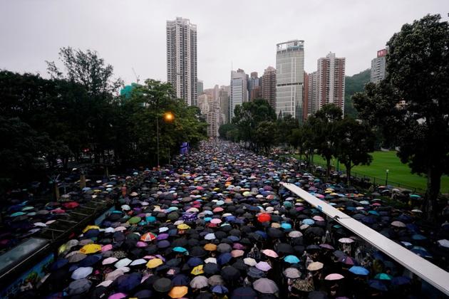 Anti-extradition bill protesters march to demand democracy and political reforms, in Hong Kong, China August 18 (REUTERS) Anti-extradition bill protesters march to demand democracy and political reforms, in Hong Kong, China August 18 (REUTERS)