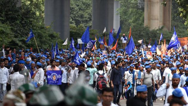 Chandrashekhar Azad Ravan, founder of Bhim Army, along with his supporters lead a march towards Ramlila Maidan in protest for the demolition of Guru Ravidas Temple in Tughlakabad few days back, at Panchkuian Marg, in New Delhi.(Sanchit Khanna/HT PHOTO)