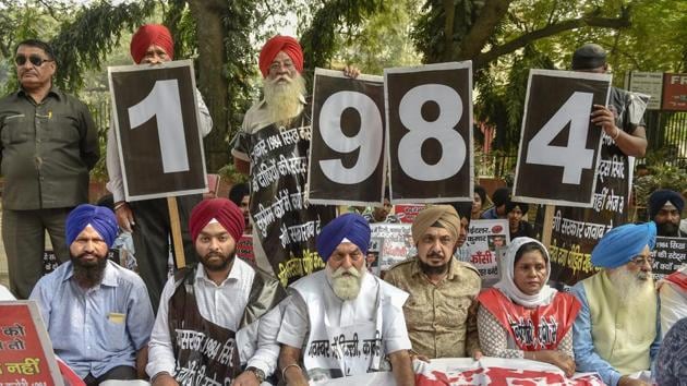 In this file picture,family members of the victims of 1984 anti-Sikh riots stage a protest at Jantar Mantar, in New Delhi (PTI) In this file picture,family members of the victims of 1984 anti-Sikh riots stage a protest at Jantar Mantar, in New Delhi (PTI)