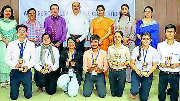 Winners with their trophies. Winners with their trophies.