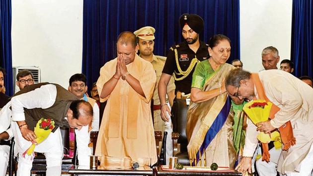 Ministers taking blessings from UP Chief Minister Yogi Aditiyanath and UP Governor Anandiben Patel who were present in ‘Swearing in Ceremony’ at Raj Bhawan,Lucknow (Dheeraj Dhawan/Hindustan Times) Ministers taking blessings from UP Chief Minister Yogi Aditiyanath and UP Governor Anandiben Patel who were present in ‘Swearing in Ceremony’ at Raj Bhawan,Lucknow (Dheeraj Dhawan/Hindustan Times)