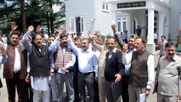 Leader opposition Mukesh Agnihotri along with Congress legislatures raising anti-government slogans outside the House in Shimla on Thursday. (Deepak Sansta/HT) Leader opposition Mukesh Agnihotri along with Congress legislatures raising anti-government slogans outside the House in Shimla on Thursday. (Deepak Sansta/HT)