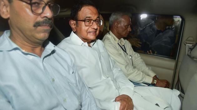 Central Bureau of Investigation (CBI) officials arrested Congress leader P Chidambaram from his Jor Bagh residence in New Delhi, Wednesday. (PTI Photo) Central Bureau of Investigation (CBI) officials arrested Congress leader P Chidambaram from his Jor Bagh residence in New Delhi, Wednesday. (PTI Photo)