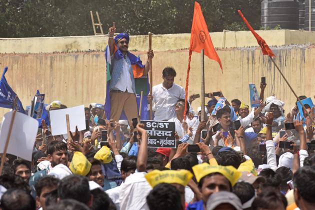 Chandrashekhar Azad Ravan, founder of Bhim Army, along with his supporters lead a march towards Ramlila Maidan in protest for the demolition of Guru Ravidas Temple in Tughlakabad few days back, at Panchkuian Marg, in New Delhi. (Sanchit Khanna/HT PHOTO) Chandrashekhar Azad Ravan, founder of Bhim Army, along with his supporters lead a march towards Ramlila Maidan in protest for the demolition of Guru Ravidas Temple in Tughlakabad few days back, at Panchkuian Marg, in New Delhi. (Sanchit Khanna/HT PHOTO)