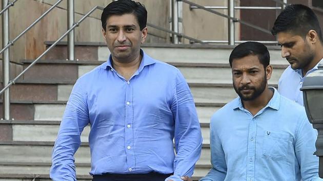 Madhya Pradesh Chief Minister Kamal Nath's nephew Ratul Puri (left) leaves Enforcement Directorate office after being arrested in connection with a <span class='webrupee'>?</span>354 crore bank loan fraud case, in New Delhi, Tuesday, Aug 20, 2019.(PTI)