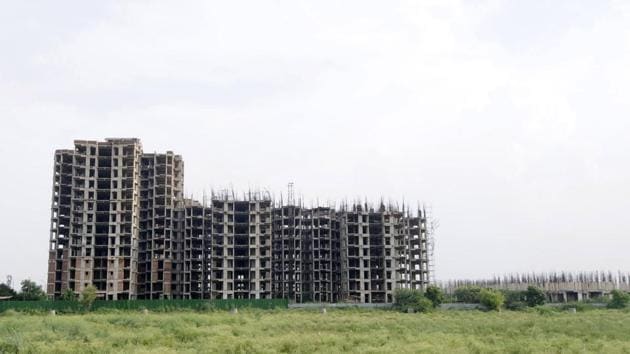 A view of the Unitech housing project in Sector 113, Noida, that has remained incomplete for the last six years. It qualifies as a ghost project under Up-Rera’s definition of projects that have overshot their deadlines by five years. (Sunil Ghosh / HT Photo) A view of the Unitech housing project in Sector 113, Noida, that has remained incomplete for the last six years. It qualifies as a ghost project under Up-Rera’s definition of projects that have overshot their deadlines by five years. (Sunil Ghosh / HT Photo)