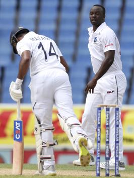 India's batsman Mayank Agarwal looks down after being dismissed by West Indies' bowler Kemar Roach. (AP) India's batsman Mayank Agarwal looks down after being dismissed by West Indies' bowler Kemar Roach. (AP)