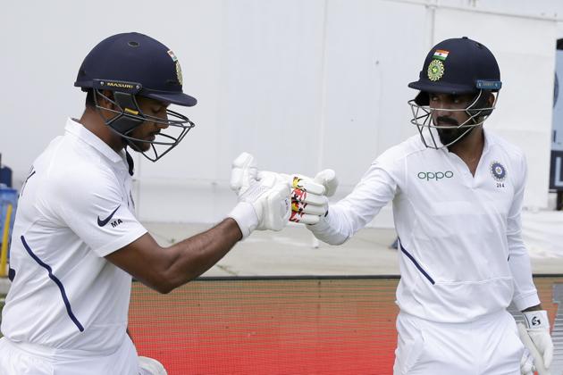 India openers KL Rahul, right, and Mayank Agarwal shake hands at the start of day one. (AP) India openers KL Rahul, right, and Mayank Agarwal shake hands at the start of day one. (AP)