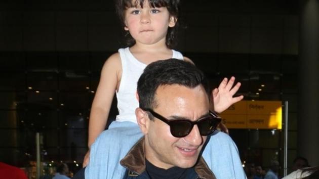 Saif Ali Khan and his son Taimur Ali Khan seen at Chhatrapati Shivaji International Airport.(IANS)