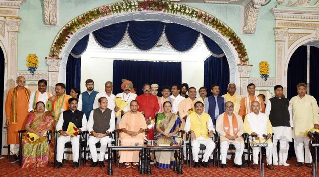Uttar Pradesh Governor Anandiben Patel and chief minister Yogi Aditiyanath with his newly-inducted ministers, August 21, 2019.(Dheeraj Dhawan / HT Photo)