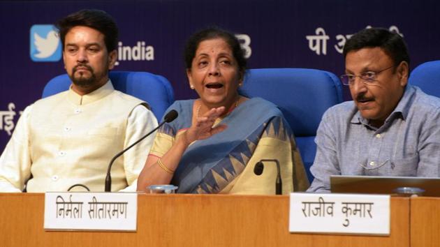 Finance Minister Nirmala Sitharaman with her MoS Anurag Thakur (L) and Finance Secretary Rajiv Kumar addresses a press conference announcing a slew of economic measures to boost growth, at National Media Centre in New Delhi, India, on Friday, August 23, 2019.(Mohd Zakir/HT PHOTO)