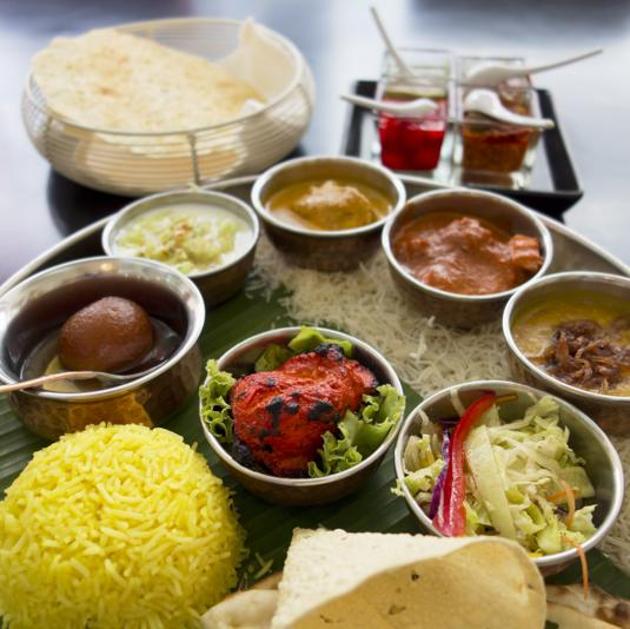 The world on a plate? It looks like a desi thali, but the gulab jamun has Persian roots, and the chicken tikka masala is actually Scottish.(iStock)