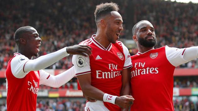 Arsenal's Pierre-Emerick Aubameyang celebrates with teammates after scoring a goal. (REUTERS) Arsenal's Pierre-Emerick Aubameyang celebrates with teammates after scoring a goal. (REUTERS)