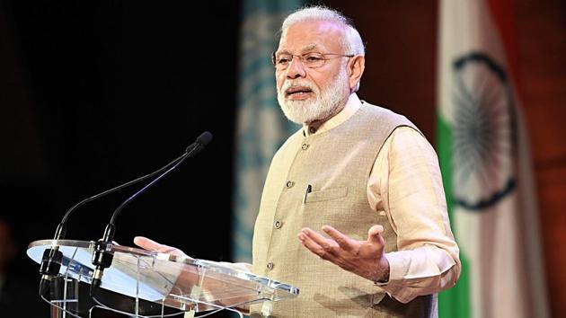 Prime Minister Narendra Modi addressing the Indian community, at UNESCO Headquarters in Paris on Friday.(ANI photo)