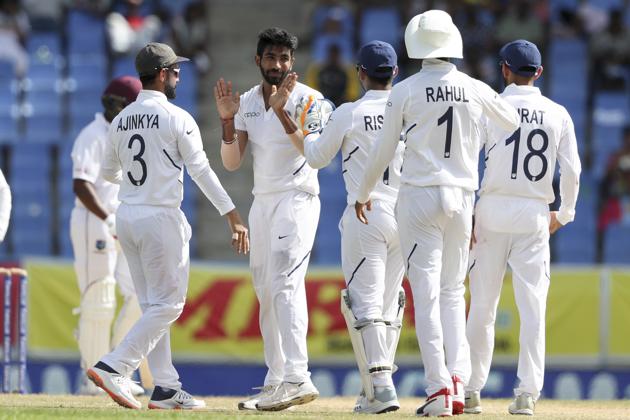 India's Jasprit Bumrah celebrates with teammates taking the wicket of West Indies' Darren Bravo. (AP) India's Jasprit Bumrah celebrates with teammates taking the wicket of West Indies' Darren Bravo. (AP)