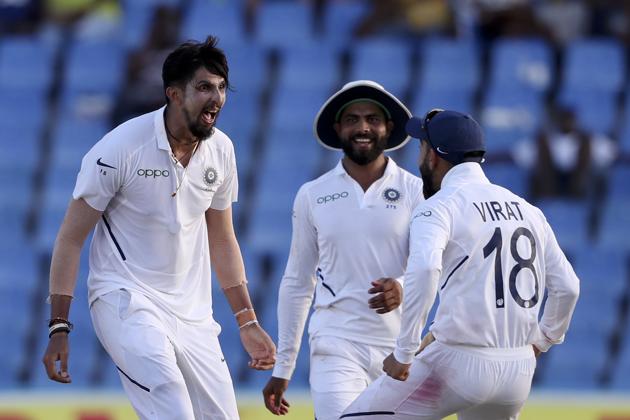 India's Ishant Sharma celebrates with captain Virat Kohli.(AP)