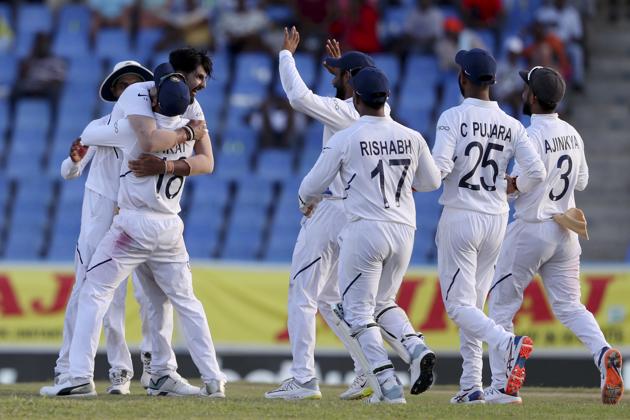 India's Ishant Sharma is embraced captain Virat Kohli after dismissing West Indies' Kemar Roach. (AP) India's Ishant Sharma is embraced captain Virat Kohli after dismissing West Indies' Kemar Roach. (AP)