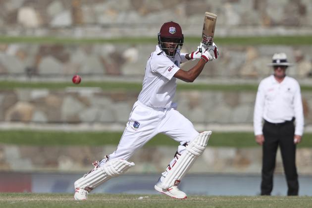 West Indies' Roston Chase plays a shot against India during day two. (AP) West Indies' Roston Chase plays a shot against India during day two. (AP)