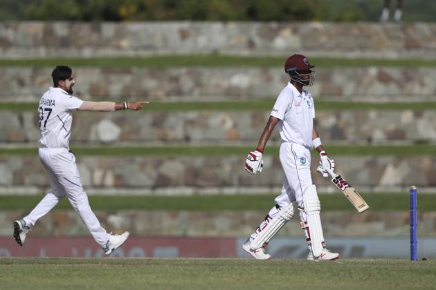 India's bowler Ishant Sharma celebrates the dismissal of West Indies' Roston Chase. (AP) India's bowler Ishant Sharma celebrates the dismissal of West Indies' Roston Chase. (AP)