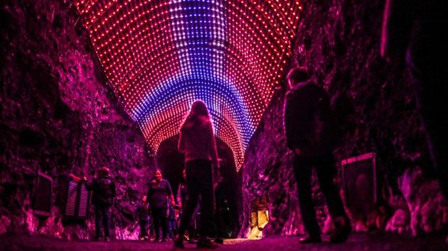 Tourists visit the Salt Cathedral of Zipaquira, an underground church built into a mine that produces salt, 45 km north of Bogota. (Juan Barreto / AFP) Tourists visit the Salt Cathedral of Zipaquira, an underground church built into a mine that produces salt, 45 km north of Bogota. (Juan Barreto / AFP)