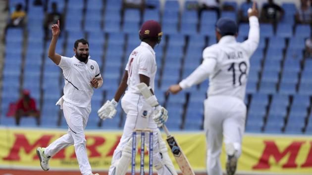Mohammed Shami , left, unsuccessfully appeals for the wicket of West Indies' Miguel Cummins during day three of the first Test match. (AP) Mohammed Shami , left, unsuccessfully appeals for the wicket of West Indies' Miguel Cummins during day three of the first Test match. (AP)