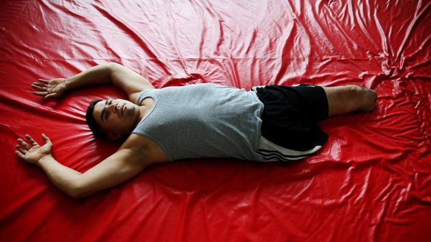 Mario, 34, a Honduran migrant who lost his leg while traveling en route to the United States on a freight train known as ‘La Bestia’, rests during a physiotherapy session at the Rehabilitation Center for Disabled People in Silao, Mexico. (Edgard Garrido / REUTERS) Mario, 34, a Honduran migrant who lost his leg while traveling en route to the United States on a freight train known as ‘La Bestia’, rests during a physiotherapy session at the Rehabilitation Center for Disabled People in Silao, Mexico. (Edgard Garrido / REUTERS)