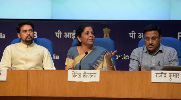 Finance Minister Nirmala Sitharaman with her MoS Anurag Thakur (L) and Finance Secretary Rajiv Kumar addresses a press conference announcing a slew of economic measures to boost growth, at National Media Centre in New Delhi. (Mohd Zakir / HT Photo) Finance Minister Nirmala Sitharaman with her MoS Anurag Thakur (L) and Finance Secretary Rajiv Kumar addresses a press conference announcing a slew of economic measures to boost growth, at National Media Centre in New Delhi. (Mohd Zakir / HT Photo)