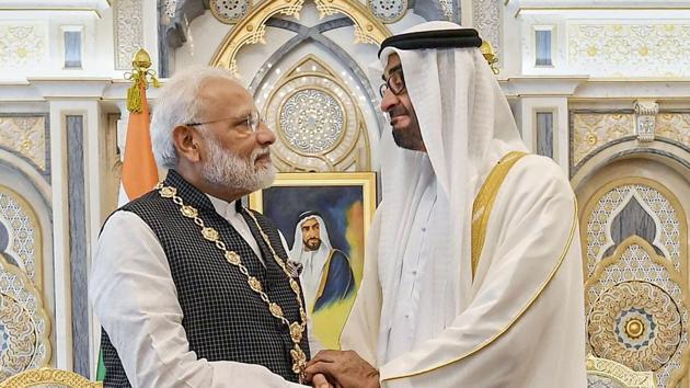 Prime Minister Narendra Modi shakes hands with Crown Prince of the Emirate of Abu Dhabi and Deputy Supreme Commander of the United Arab Emirates Armed Forces Sheikh Mohammed bin Zayed Al Nahyan after being conferred ' Order of Zayed'-- UAE's highest civil decoration, in Abu Dhabi, Saturday, Aug 24, 2019.(PTI photo)