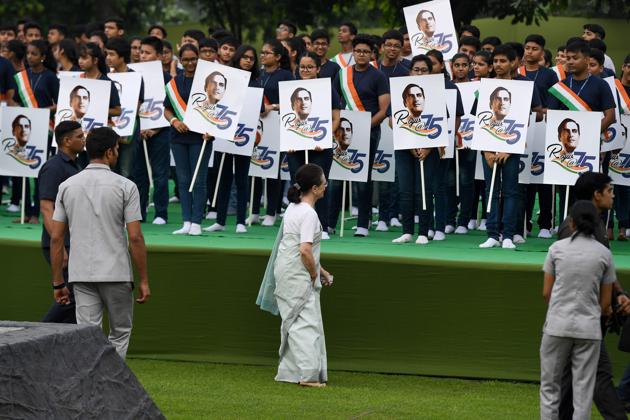 Sonia Gandhi (L), Congress Party interim president and wife of former Indian Prime Minister Rajiv Gandhi, greets children during a memorial ceremony to mark the 75th birth anniversary of Rajiv Gandhi in New Delhi. (Money Sharma / AFP) Sonia Gandhi (L), Congress Party interim president and wife of former Indian Prime Minister Rajiv Gandhi, greets children during a memorial ceremony to mark the 75th birth anniversary of Rajiv Gandhi in New Delhi. (Money Sharma / AFP)