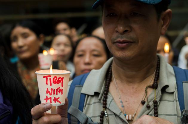 Exiled Tibetans march in a candlelight vigil to stand in solidarity with the protesters in Hong Kong, in McLeod Ganj, Himachal Pradesh. (Lobsang Wangyal / AFP) Exiled Tibetans march in a candlelight vigil to stand in solidarity with the protesters in Hong Kong, in McLeod Ganj, Himachal Pradesh. (Lobsang Wangyal / AFP)