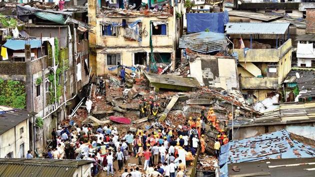 Two died and five were injured when the ground plus four floored Munnavar building collapsed in Bhiwandi Shanti nager area on Saturday around 1.15am. Twenty-two families were evacuated from the building which was illegally built. The rescue operation was carried out by TDRF and NDRF team. (Praful Gangurde/ HT Photo) Two died and five were injured when the ground plus four floored Munnavar building collapsed in Bhiwandi Shanti nager area on Saturday around 1.15am. Twenty-two families were evacuated from the building which was illegally built. The rescue operation was carried out by TDRF and NDRF team. (Praful Gangurde/ HT Photo)