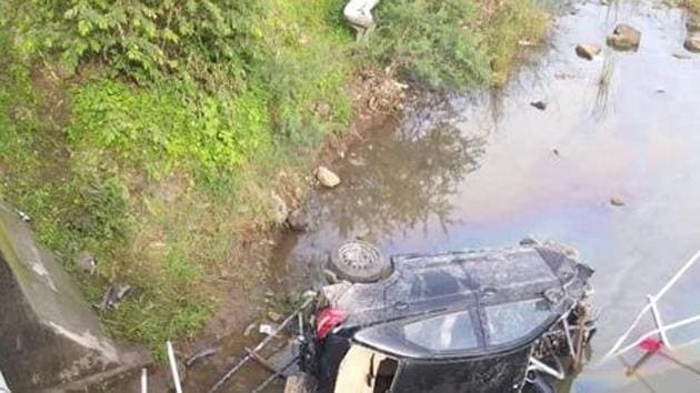 Shinde crashed into the iron railings on the side of the road and the car fell into the river in Anjaneri ghat area. Rohit and Sankhe were thrown out of the car owing to the impact of the crash, said officers. (HT PHOTO) Shinde crashed into the iron railings on the side of the road and the car fell into the river in Anjaneri ghat area. Rohit and Sankhe were thrown out of the car owing to the impact of the crash, said officers. (HT PHOTO)