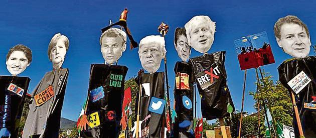 Cutout of the heads of the G7 leaders are pictured ahead of the protest march during the G7 summit, in Hendaye, France (REUTERS) Cutout of the heads of the G7 leaders are pictured ahead of the protest march during the G7 summit, in Hendaye, France (REUTERS)