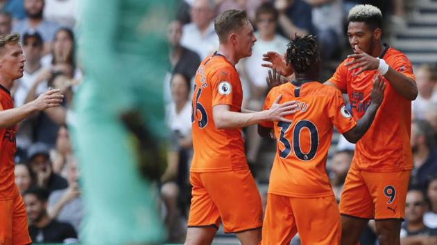 Newcastle's Joelinton, right, celebrates after scoring his side's first goal. (AP) Newcastle's Joelinton, right, celebrates after scoring his side's first goal. (AP)