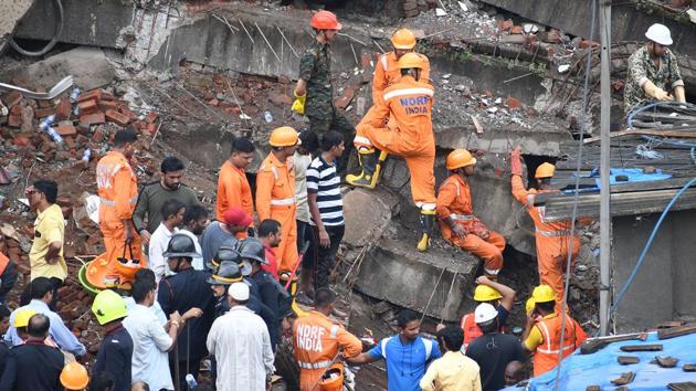 Two died and five were injured when the ground plus four floored Munnavar building collapsed in Bhiwandi Shanti nager area on Saturday around 1.15am. Twenty-two families were evacuated from the building which was illegally built. The rescue operation was carried out by TDRF and NDRF team.(Praful Gangurde/ HT Photo) Two died and five were injured when the ground plus four floored Munnavar building collapsed in Bhiwandi Shanti nager area on Saturday around 1.15am. Twenty-two families were evacuated from the building which was illegally built. The rescue operation was carried out by TDRF and NDRF team.(Praful Gangurde/ HT Photo)
