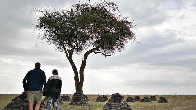 Tourists visit the Rhino-memorial where headstones bearing names of the dead rhinos, including Sudan, the world’s last nothern white rhino male who died in 2018 at the ol-Pejeta conservancy in Nanyuki, 147 kilometres north of Kenyan capital, Nairobi. The northern white rhino once roamed Uganda, the Central African Republic, Sudan and Chad. It is hoped a revived population -- which could take up to 70 years could eventually be re-introduced into secure habitats in these areas. (Tony Karumba / AFP) Tourists visit the Rhino-memorial where headstones bearing names of the dead rhinos, including Sudan, the world’s last nothern white rhino male who died in 2018 at the ol-Pejeta conservancy in Nanyuki, 147 kilometres north of Kenyan capital, Nairobi. The northern white rhino once roamed Uganda, the Central African Republic, Sudan and Chad. It is hoped a revived population -- which could take up to 70 years could eventually be re-introduced into secure habitats in these areas. (Tony Karumba / AFP)
