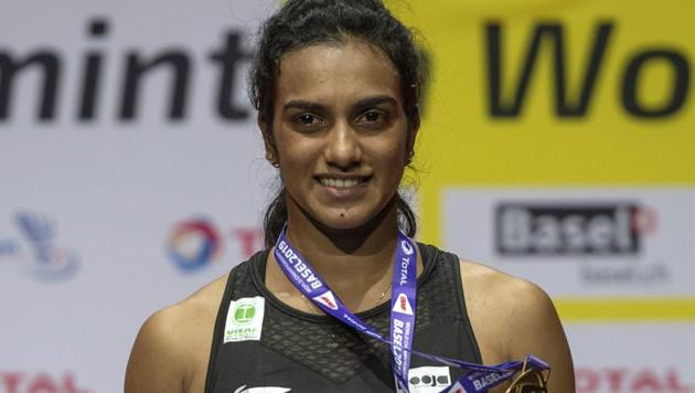 India's gold-medallist Pusarla V. Sindhu after winning her women's singles final match against Japan's Nozomi Okuhara at the BWF Badminton World Championships in Basel, Switzerland(AP)