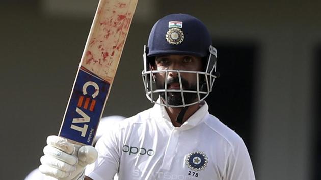 India's Ajinkya Rahane celebrates scoring half a century against West Indies in the first Test. (AP) India's Ajinkya Rahane celebrates scoring half a century against West Indies in the first Test. (AP)