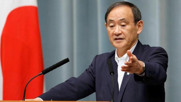 Japan's Chief Cabinet Secretary Yoshihide Suga did not think Tokyo compromised too much trade talks with US .(Reuters photo) Japan's Chief Cabinet Secretary Yoshihide Suga did not think Tokyo compromised too much trade talks with US .(Reuters photo)