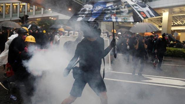 Hong Kong police said that they arrested 36 people, the youngest aged 12, after violence during anti-government demonstrations escalated.(Reuters Photo)