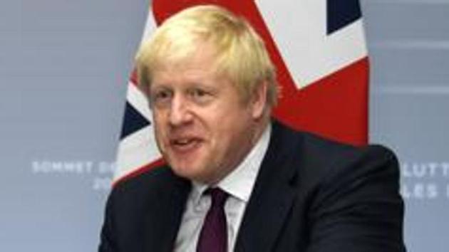 Britain's Prime Minister Boris Johnson meets European Union Council President Donald Tusk at a bilateral meeting during the G7 summit in Biarritz.(Reuters photo)