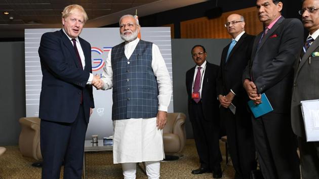 Britain's Prime Minister Boris Johnson meets Indian Prime Minister Narendra Modi at a bilateral meeting during the G7 summit in Biarritz, France August 25, 2019(REUTERS)