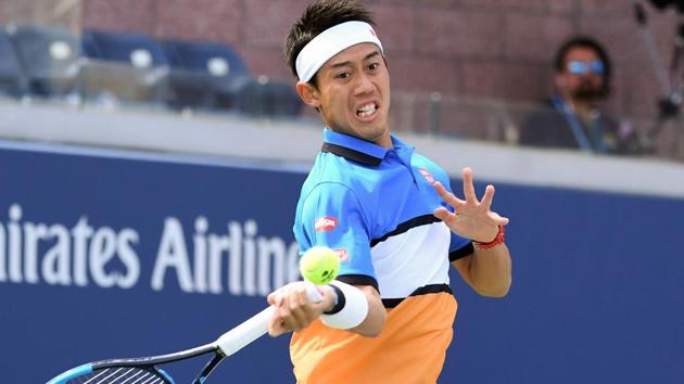 Kei Nishikori of Japan hits to Marco Trungelliti (not pictured) of Argentina.(USA TODAY Sports)