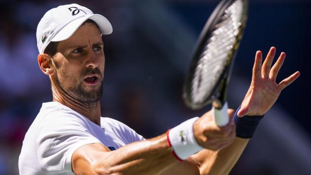 Novak Djokovic, of Serbia, returns the ball as he practices for the U.S. Open tennis tournament. (AP) Novak Djokovic, of Serbia, returns the ball as he practices for the U.S. Open tennis tournament. (AP)