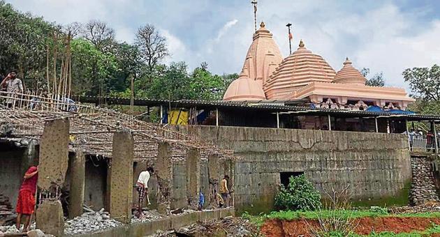 Trustees of the Balayogi Shri Sadanand Maharaj Ashram demolished an under-construction dormitory, adjacent to the main structure, at Tungareshwar Wildlife Sanctuary on Monday. (HT Photo) Trustees of the Balayogi Shri Sadanand Maharaj Ashram demolished an under-construction dormitory, adjacent to the main structure, at Tungareshwar Wildlife Sanctuary on Monday. (HT Photo)