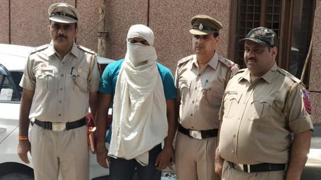 The 19-year-old main accused in police custody, August 26, 2019. (HT Photo) The 19-year-old main accused in police custody, August 26, 2019. (HT Photo)