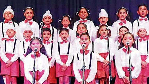 Junior school choir presenting a school.(HT)