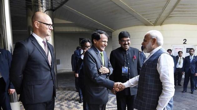 Suresh Prabhu with PM Modi in Biarritz, France.