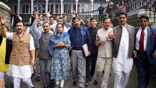 Leader opposition Mukesh Agnihotri (third from left) along with Congress legislatures staging a walk out during monsoon session in Shimla on Tuesday. (Deepak Sansta /HT) Leader opposition Mukesh Agnihotri (third from left) along with Congress legislatures staging a walk out during monsoon session in Shimla on Tuesday. (Deepak Sansta /HT)