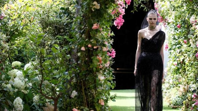 A model presents a creation by designer Maria Grazia Chiuri as part of her Haute Couture Fall/Winter 2019/20 collection show for fashion house Dior in Paris.(REUTERS)